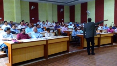 Dr. Sanjay Runwal explaining a concept at NAIR, Vadodara